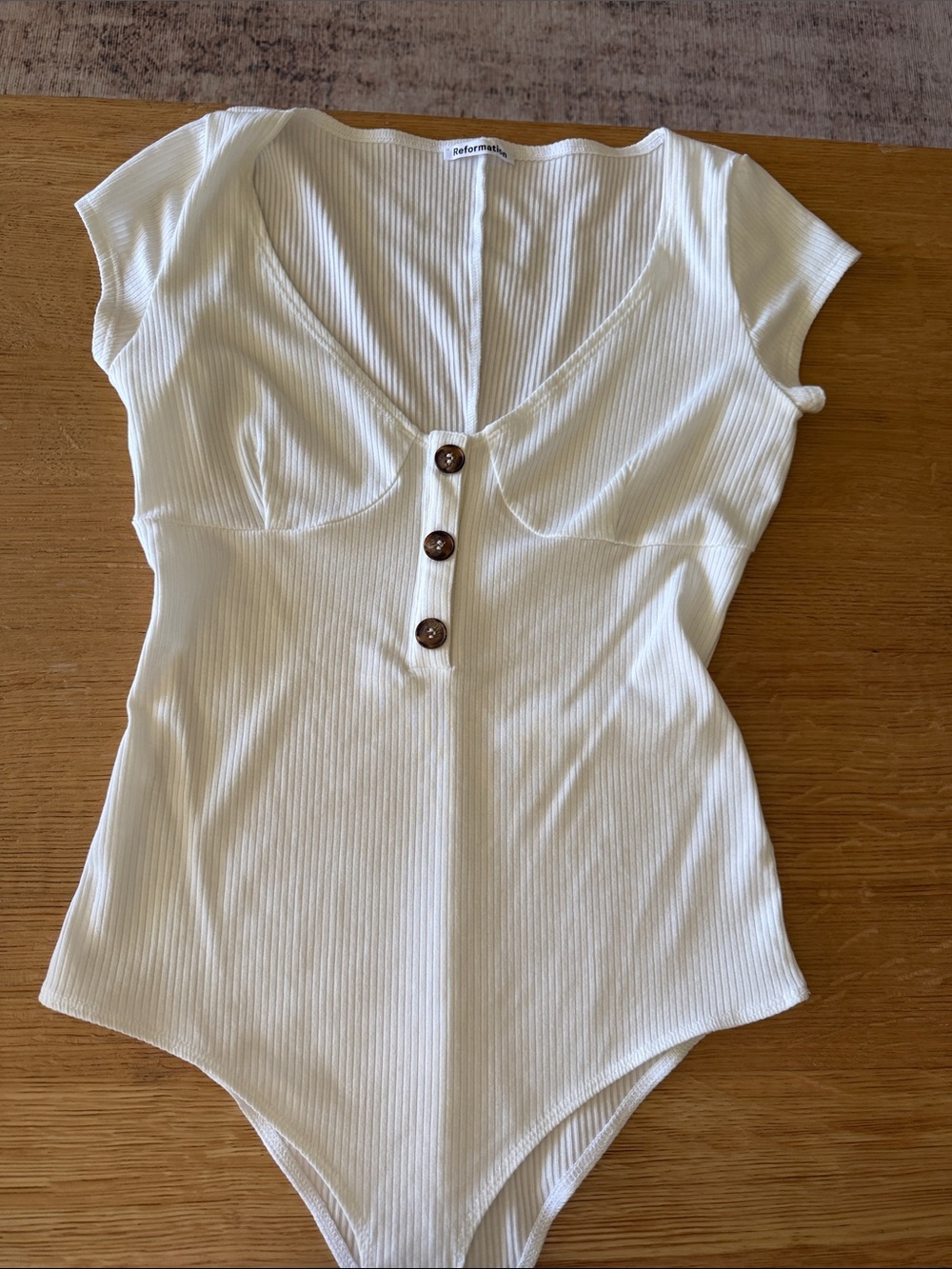 Reformation Cream Ribbed Button-Front Scoop Bodysuit